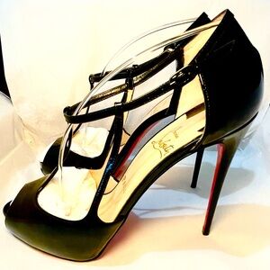 Christian Louboutin ankle strap cage peeptoe pumps. Glossy patent black
38.5